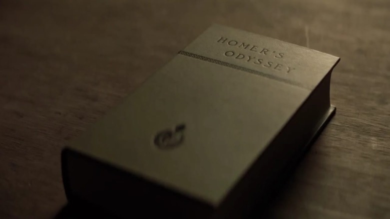 a copy of Homer's "Odyssey" on table