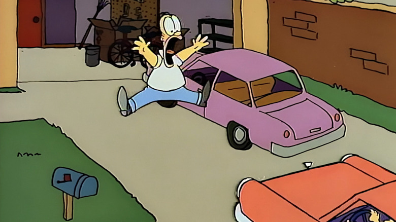 Homer is almost hit by a car