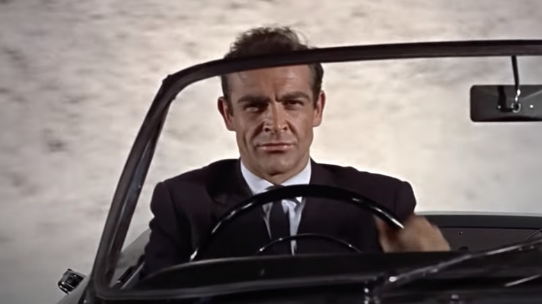 Bond drives a car