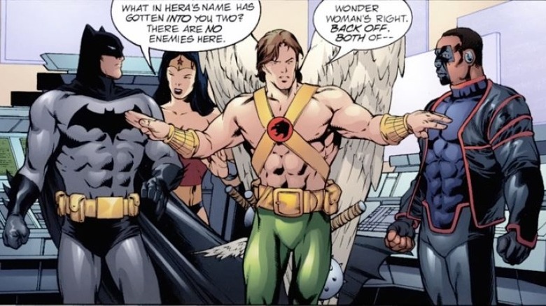 Hawkman seperating Batman and Mister Terrific