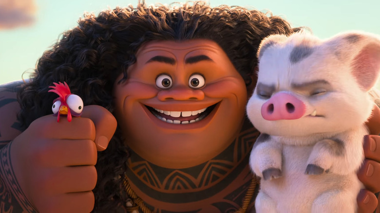 Maui holding Pua and Hai Hai