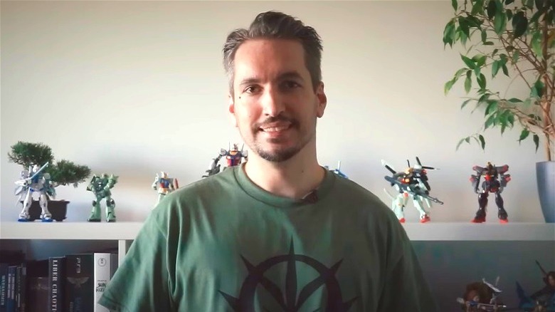 Erasmus Brosdau with Gundam figures