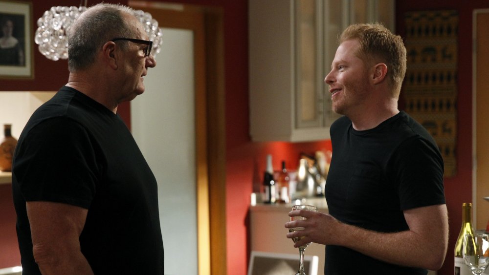 Ed O'Neill as Jay Pritchett and Jesse Tyler Ferguson as Mitchell Pritchett in Modern Family