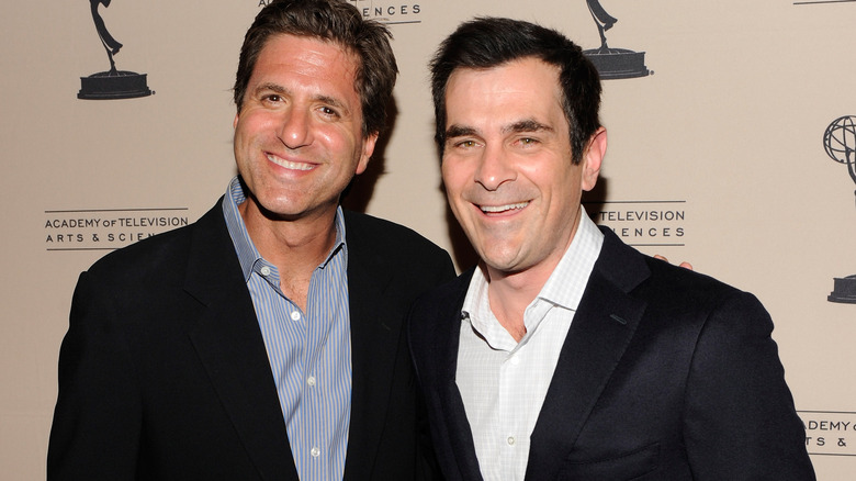 Steven Levitan and Ty Burrell pose at event 