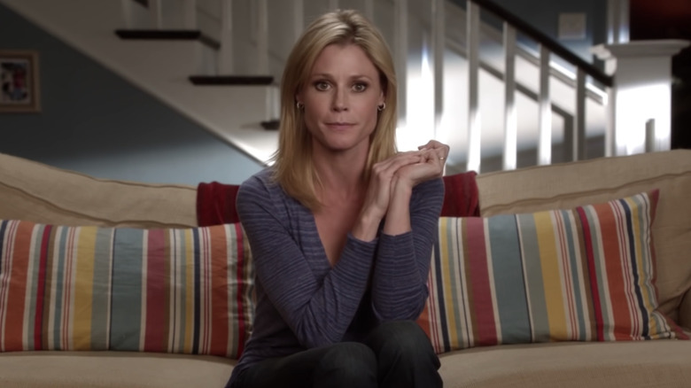 Julie Bowen looking unnerved on the couch