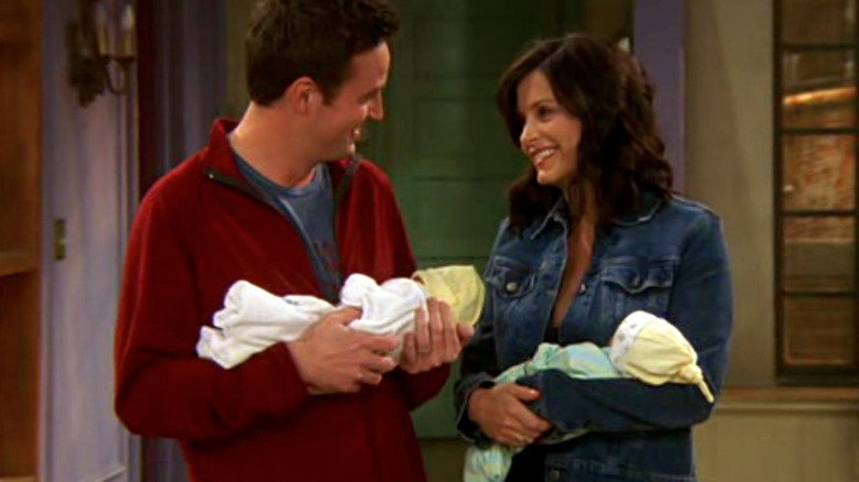 Friends Chandler and Monica with babies