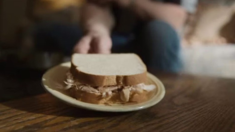 Dahmer gives Glenda a sandwich