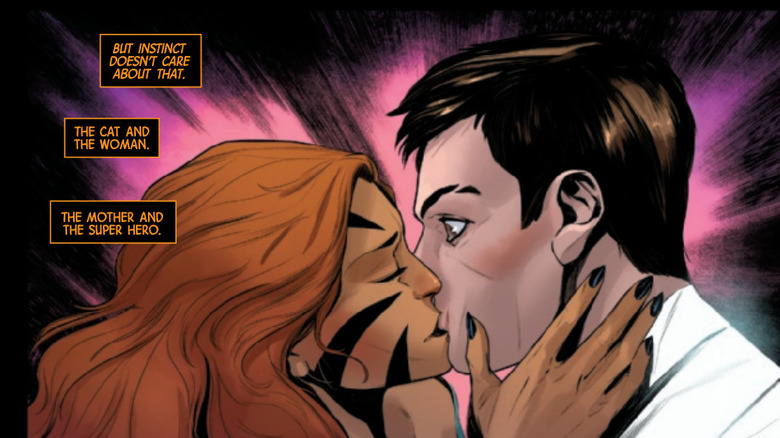 Tigra kisses Marc Spector