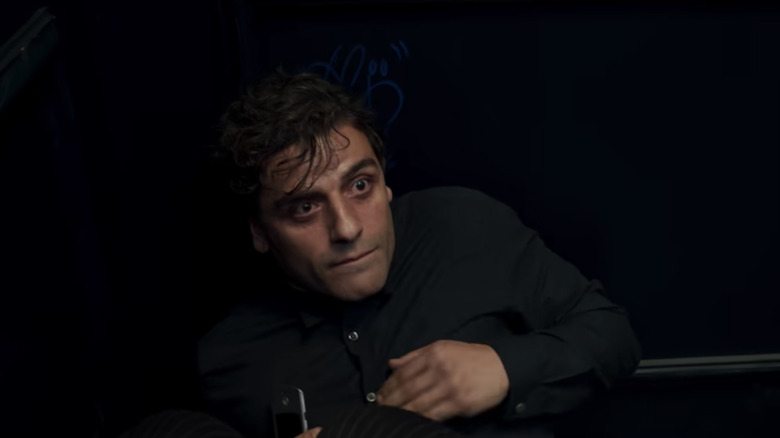 Oscar Isaac looking terrified in an Elevator