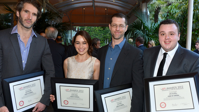 Benioff, Clarke, Weiss, and Bradley with awards