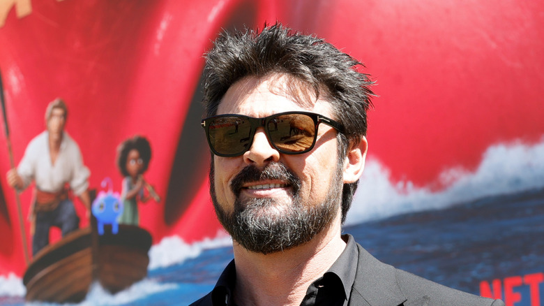 Karl Urban wearing sunglasses