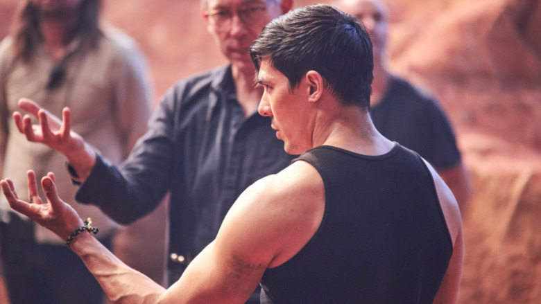 Lewis Tan takes direction on the set of Mortal Kombat