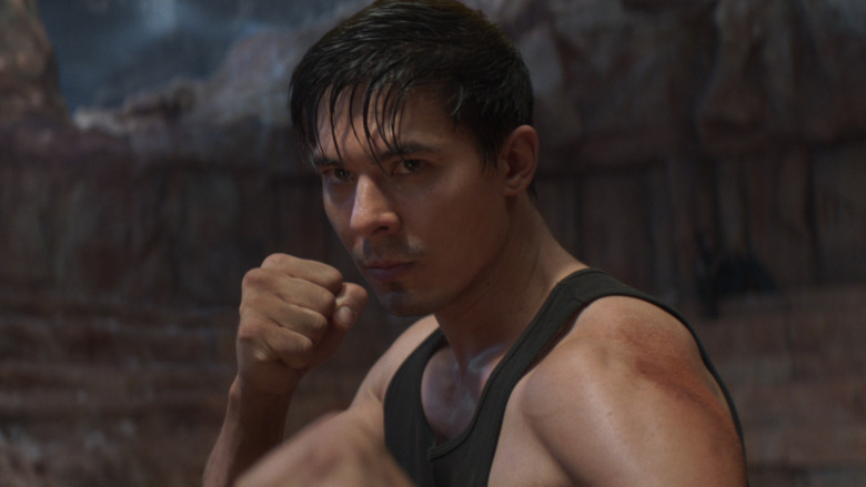 Lewis Tan with fist in fighting stance