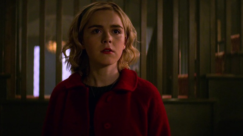 Sabrina Spellman wearing red coat