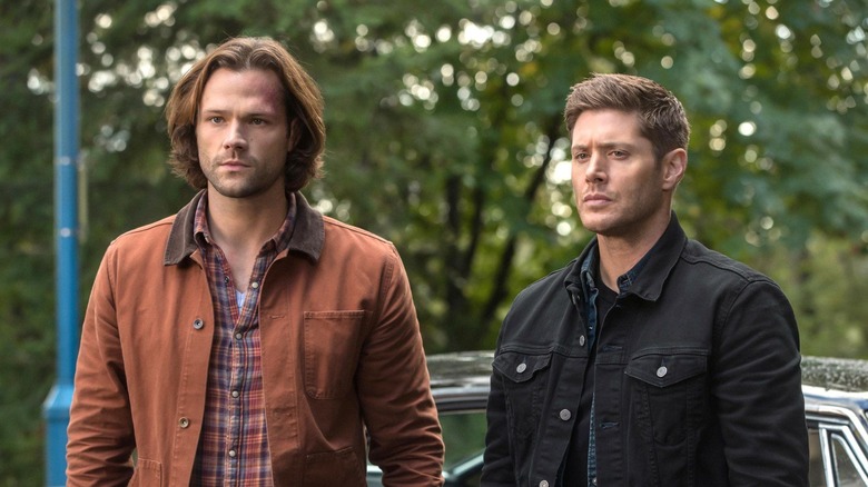 Dean and Sam scowling