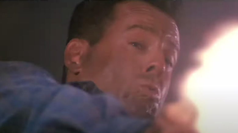 John McClane firing gun