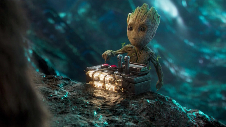 Groot points at the wrong button on the bomb