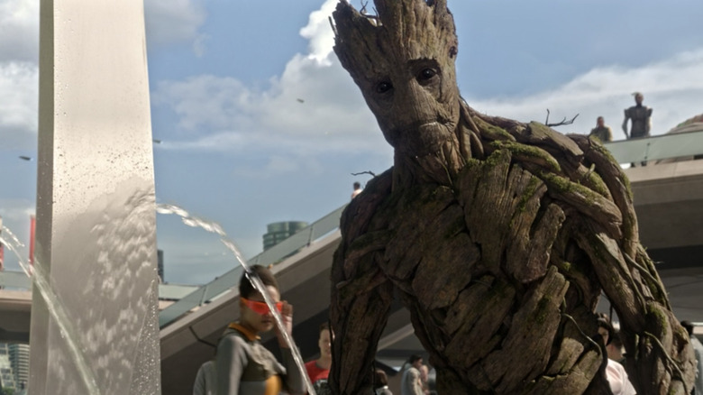 Groot stands before the fountain