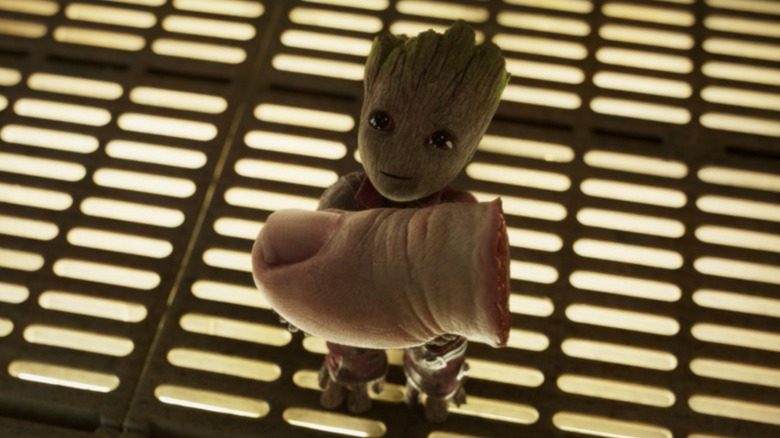 Groot holding a severed toe