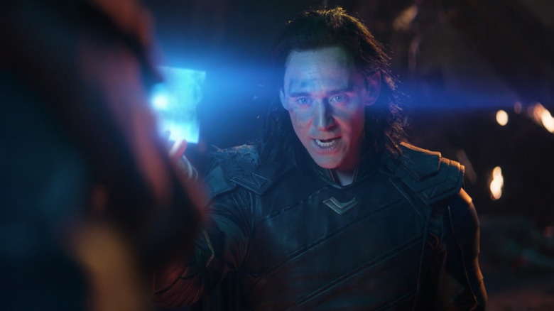 Loki holding Tesseract 