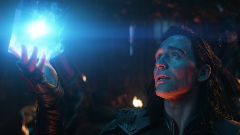 Loki holding the Tesseract