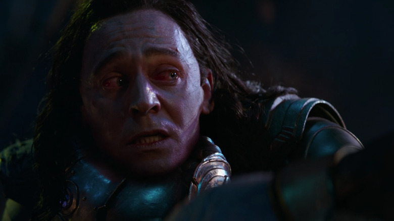 Loki being choked