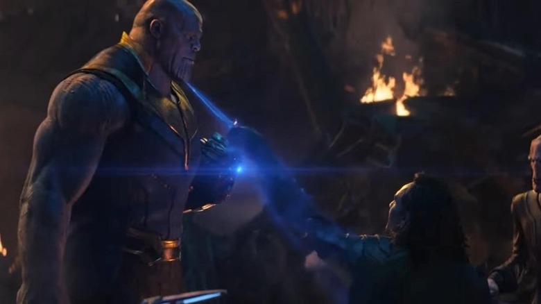 Thanos attacked by Loki