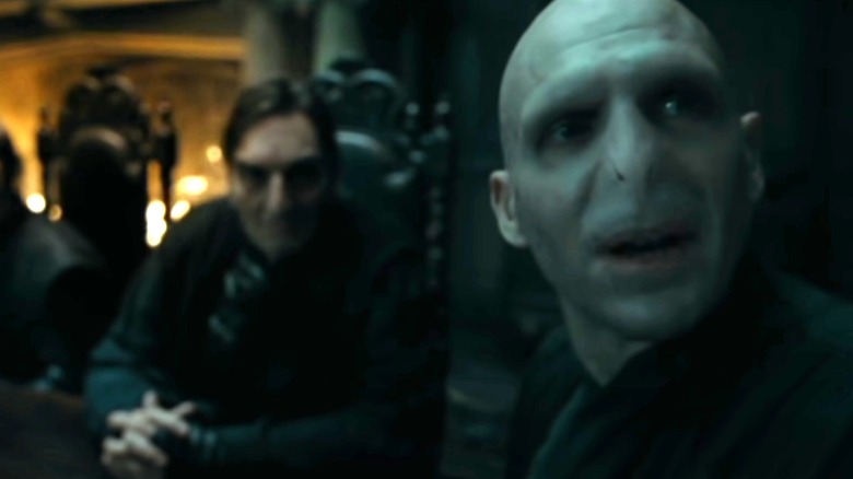 Voldemort greets Snape with a cold welcome.