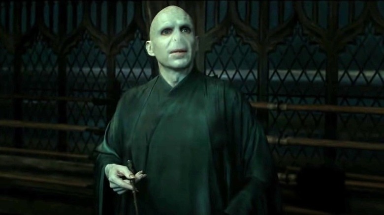 Voldemort stares down Snape before killing him.