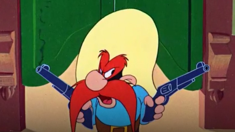 Yosemite Sam holds guns