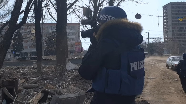 Journalist filming in Ukraine