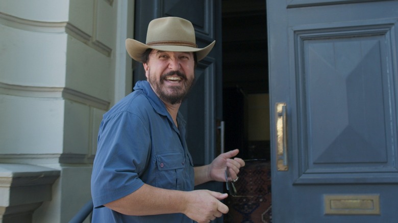 Michael Organ entering his home