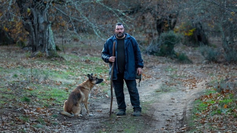 Antoine and dog on road