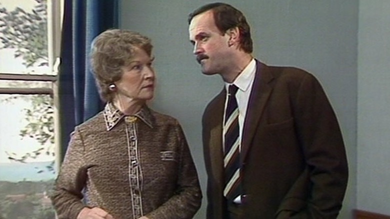 Mrs. Richards and Basil Fawlty talking