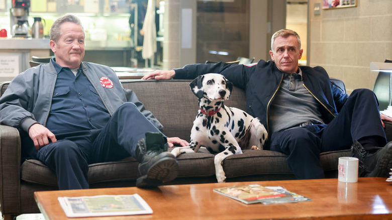 Christian Stolte and dog and Christopher Herrmann on couch