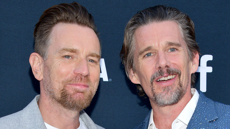 Ewan McGregor and Ethan Hawke smiling