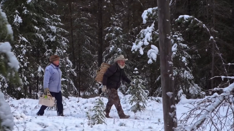 Tom Oar and his wife Nancy walking through Yaak River Valley