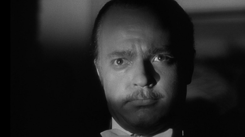 Charles Foster Kane in dark theater