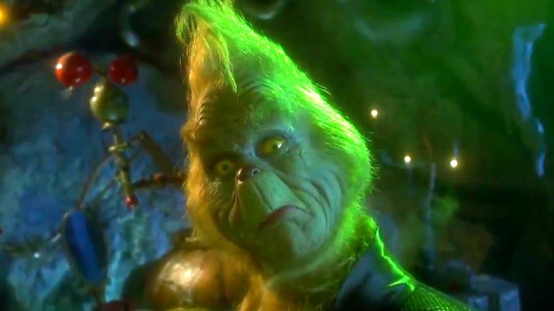 The Grinch tilts his head