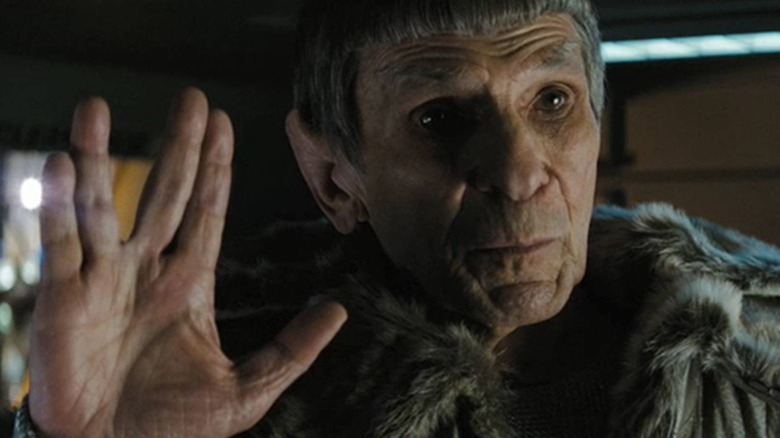 Old Spock giving Vulcan salute