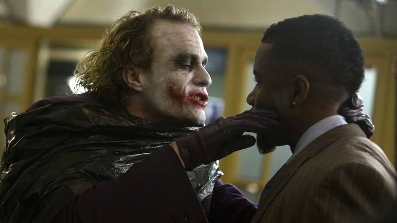 The Joker threatens Gambol in The Dark Knight