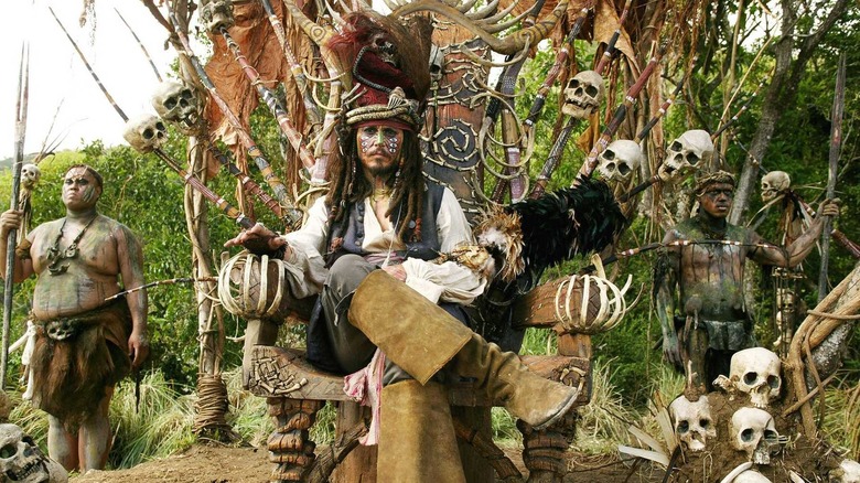 Johnny Depp sitting on a throne