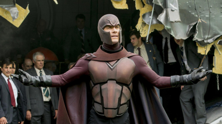 Magneto raising his arms