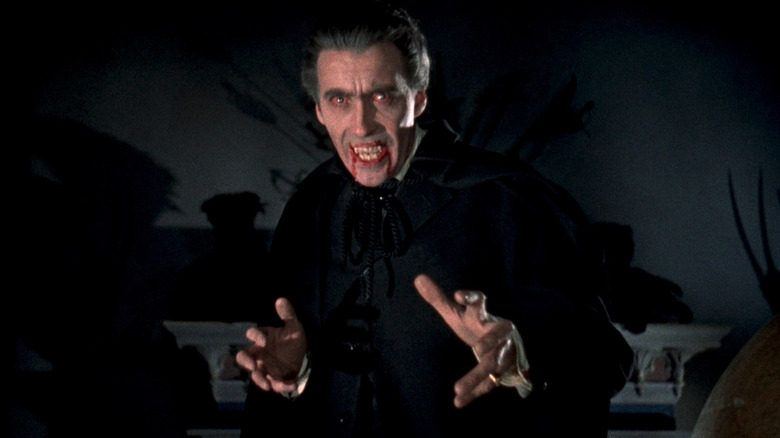 Dracula shows his bloody teeth