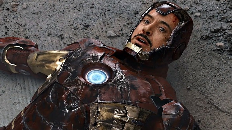 Tony Stark lays on the ground