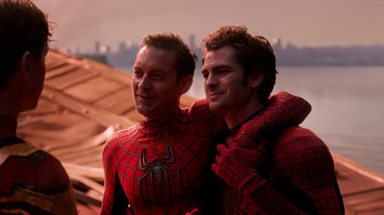 Three Spider-Men talking