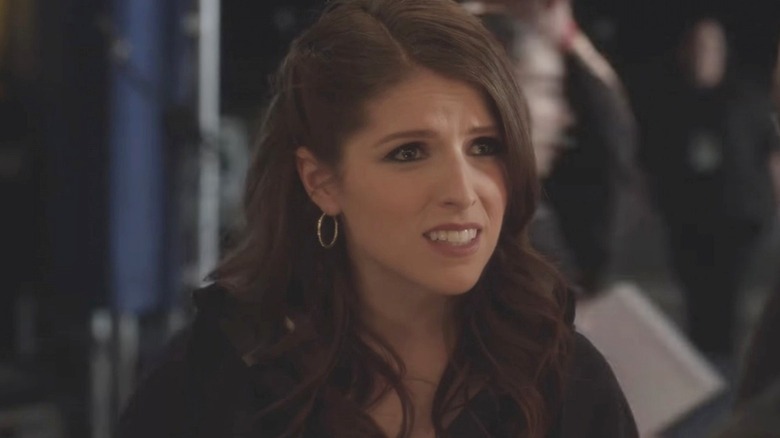 Beca looking alarmed