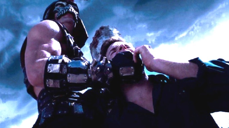 Shao Khan grabs Johnny Cage