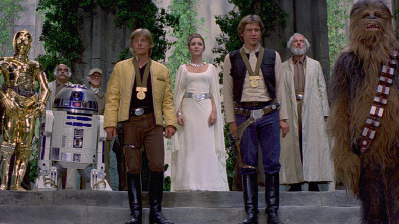 Luke and Han wearing hero medals