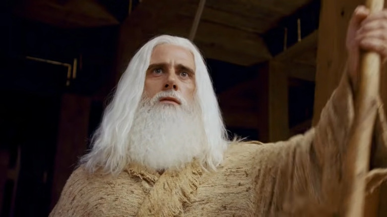 Evan Baxter with a beard and long white hair